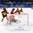 GANGNEUNG, SOUTH KOREA - FEBRUARY 20: Germany's Yannic Seidenberg #36 gets the puck past Switzerland's Jonas Hiller #1 to score an overtime goal with Simon Moser #82 and Ramon Untersander #65 looking on during qualification playoff round action at the PyeongChang 2018 Olympic Winter Games. (Photo by Matt Zambonin/HHOF-IIHF Images)

